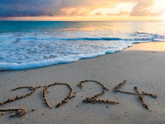 Ocean beach with 2024 written on it