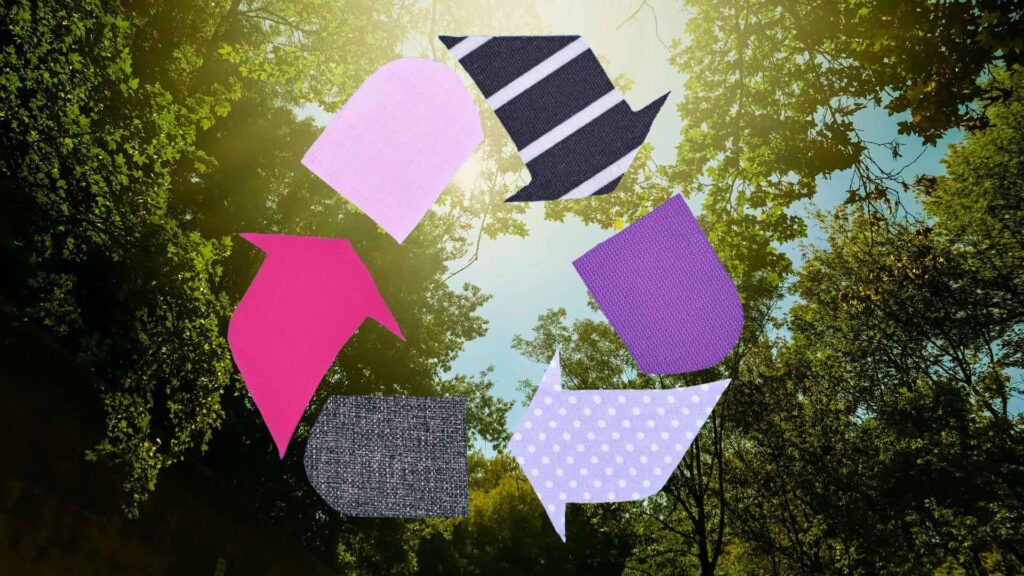 Recycled cloth logo over a green forest